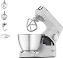 Robot pâtissier Kenwood blanc avec bol inox, feuille et accessoires.