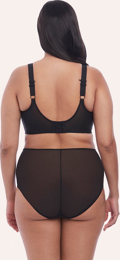 Model van achteren gezien in een zwarte plunge bh en een hoge slip met doorschijnende stof.