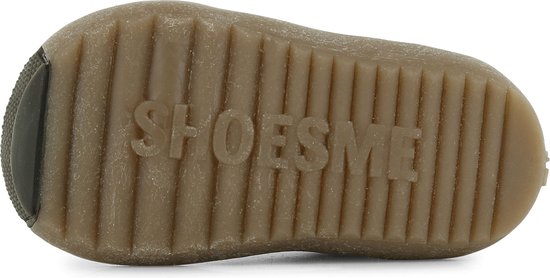 Zool van bruine leren enkellaars met ribbels en 'SHOESME' logo.