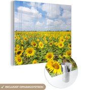 MuchoWow® Glasschilderij 20x20 cm - Schilderij acrylglas - Zonnebloemen - Bloemen - Wolken - Natuur - Geel - Landschap - Foto op glas - Schilderijen