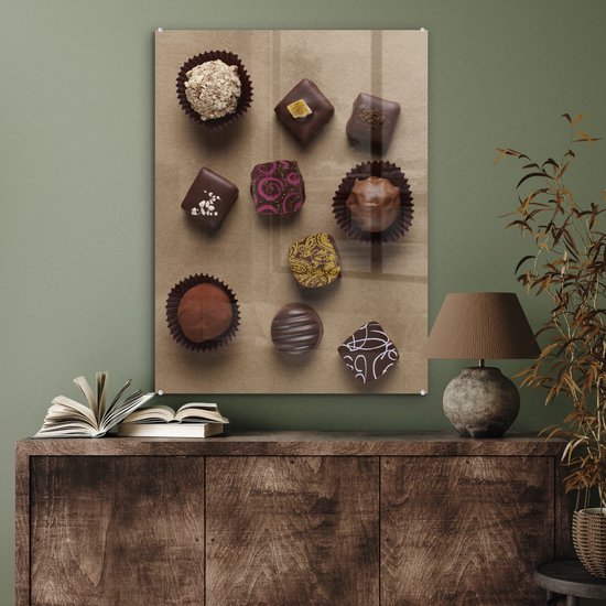 MuchoWow® Peinture sur verre 60x80 cm - Peinture sur verre acrylique - Chocolats sur fond marron - Photo sur verre - Peintures