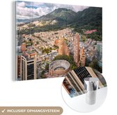 MuchoWow® Glasschilderij 90x60 cm - Schilderij acrylglas - Luchtfoto van Bogota in Colombia - Foto op glas - Schilderijen