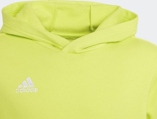 Fermeture d'un sweat à capuche jaune vif avec capuche et logo adidas.