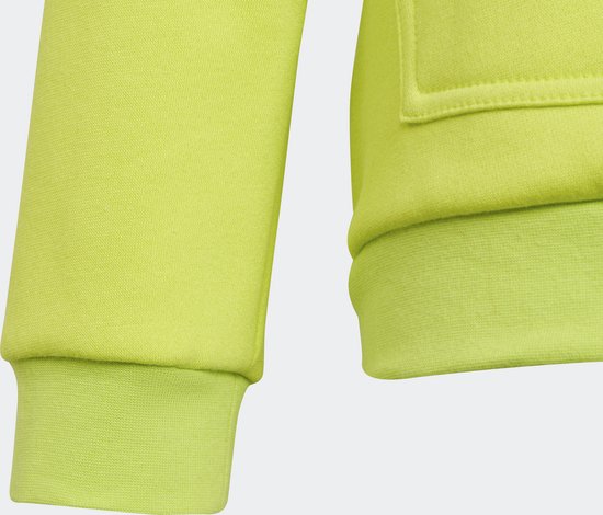 Détail de la manche et de l'ourlet d'un sweat à capuche jaune vif.