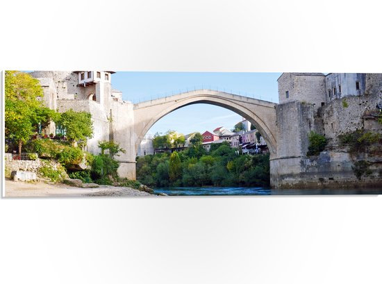 WallClassics - PVC Schuimplaat- Stari Most Brug in Bosnië op Zonnige Dag - 60x20 cm Foto op PVC Schuimplaat