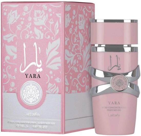 Bouteille et boîte roses avec des détails argentés et blancs, portant l'inscription 'YARA PURE CONCENTRATED PERFUME OIL Lattafa'.