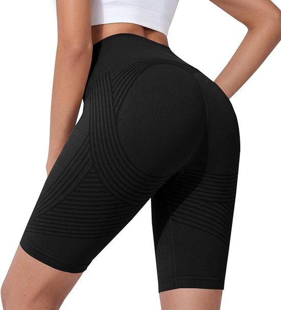 Zwarte korte legging met tailleband en golvende lijnen, gedragen door een vrouw.