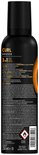 Aérosol noir avec texte jaune et blanc, 'CURL MOUSSE 3IN1 STYLE CARE DEFINE'. Arrière.