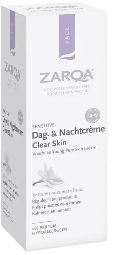 ZARQA Dag- & Nachtcrème Clear Skin pot met witte en paarse opdruk. "New" en "Sensitive" logo's.