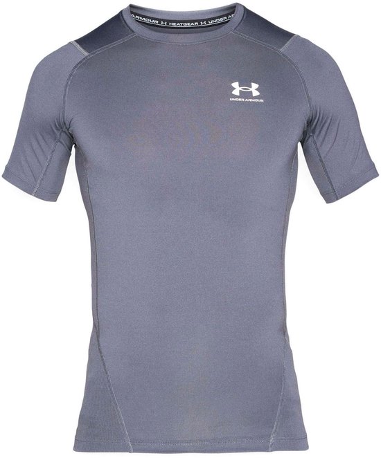 Grijs Under Armour HeatGear compressie sportshirt met korte mouwen en wit logo.
