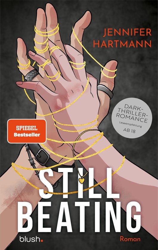 Boekomslag van 'Still Beating' van Jennifer Hartmann met handen verstrikt in gouden draden. 'SPIEGEL Bestseller' en 'Dark-Thriller-Romance' is zichtbaar.