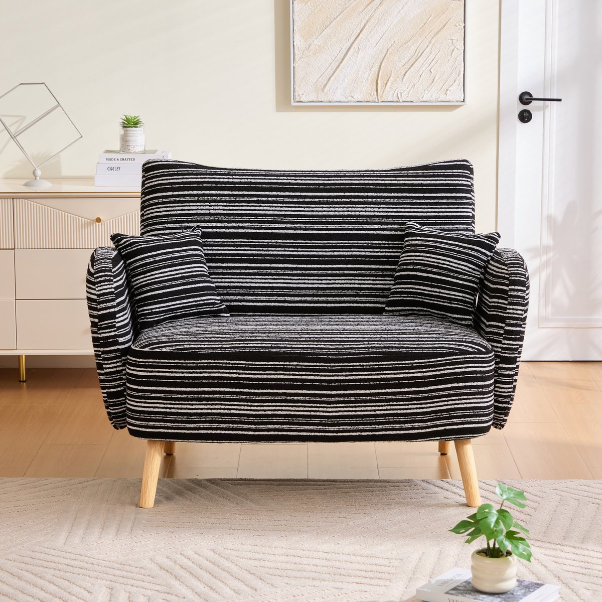 MEUNIQ 2-zitsbank van bouclé in zwart met armleuningen, opbergtas en hoge houten poten, modern zitmeubel voor woonkamer, slaapkamer of kantoor