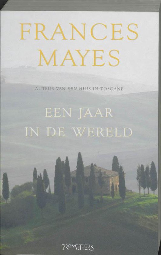 Boekcover "Een Jaar In De Wereld" van Frances Mayes met Toscaans landschap.