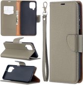 Voor Samsung Galaxy A12 Litchi Textuur Pure Kleur Horizontale Flip PU Lederen Case met Houder & Kaartsleuven & Portemonnee & Lanyard (Grijs)