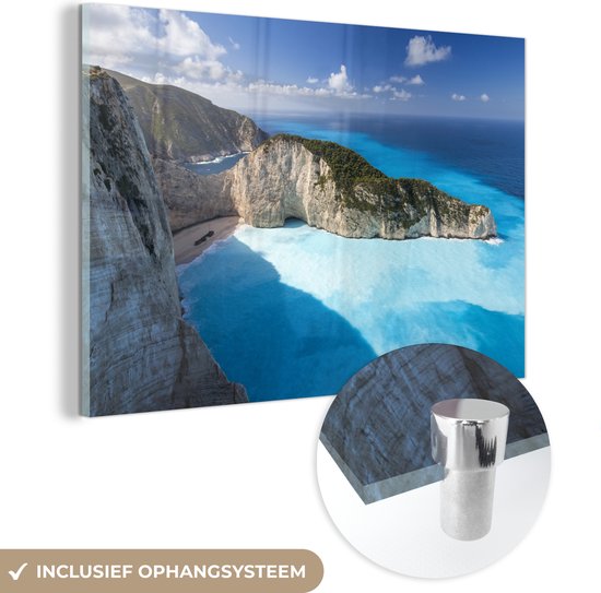 MuchoWow® Glasschilderij 120x80 cm - Schilderij acrylglas - Luchtfoto van Navagio Beach op Zakynthos - Foto op glas - Schilderijen