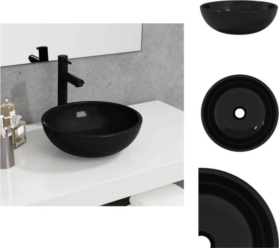 Lavabo noir en verre trempé, avec robinet noir.