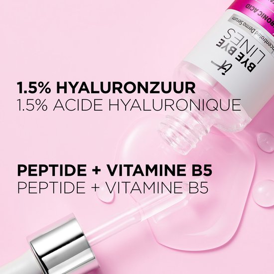 Doorzichtige serum druppelt uit een pipet op een roze achtergrond. Bevat 1.5% hyaluronzuur, peptide + vitamine B5.