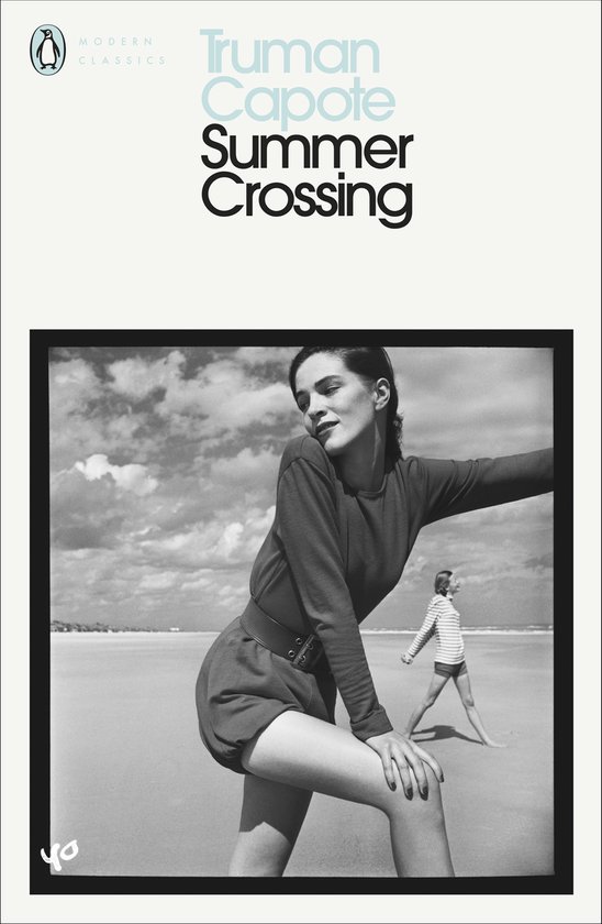 Vrouw in badpak met korte broek aan de waterlijn, zomerse dag. Titel: Truman Capote Summer Crossing.