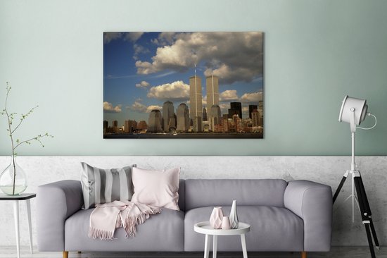 Canvas Schilderij Wolken omringen het World trade center in New York - 120x80 cm - Wanddecoratie