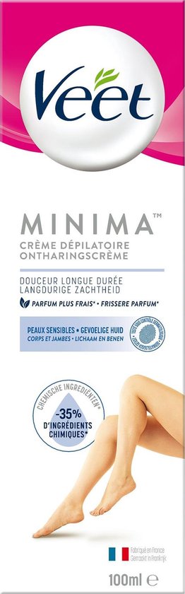 Verpakking van Veet Minima ontharingscrème. Roze en wit design met Veet logo. Toont benen, met tekst '-35% chemische ingrediënten' en 'Gevoelige huid'. Inhoud 100ml.