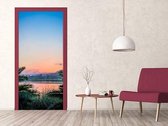 Sticky Decoration - Luxe Deursticker Zonsondergang in tropisch woud - op maat voor jouw deur
