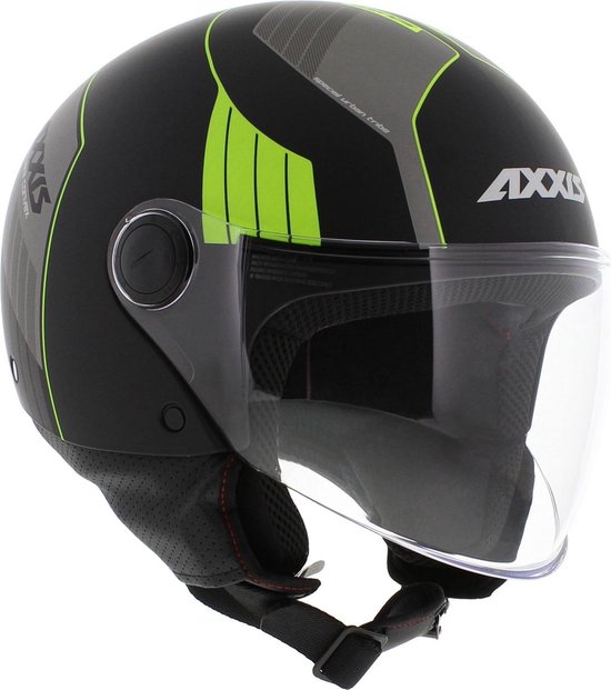 Casque noir avec accents vert vif et gris, logos et visière.