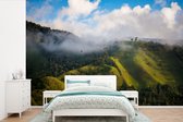 Behang - Fotobehang Mistige vallei in Colombia - Breedte 525 cm x hoogte 350 cm