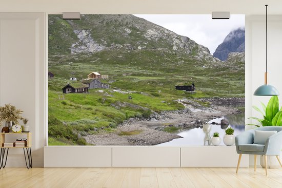 Chalets près d'un lac en Norvège fotobehang