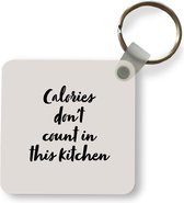 Sleutelhanger - Uitdeelcadeautjes - Quotes - Koken - Spreuken - Calories don't count in this kitchen - Plastic
