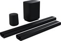 Set van zwarte Harman Kardon speakers en subwoofers, op witte achtergrond.