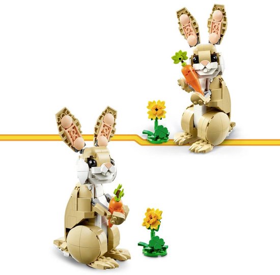 Deux lapins LEGO avec carotte et fleur, fond blanc.
