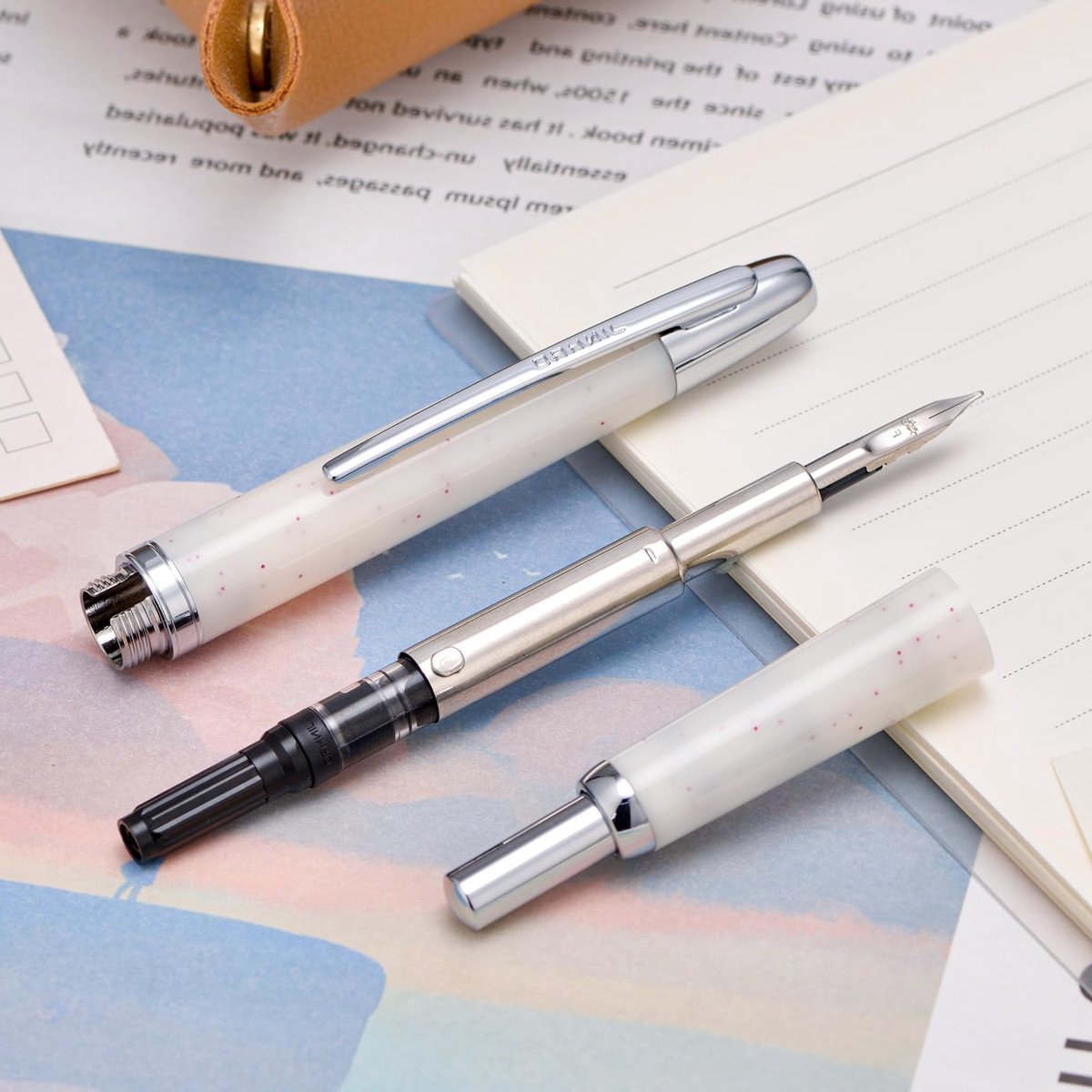 Elegante vulpen met medium nib en inktconverter set, sneeuwwit en met zilveren clip, perfect voor dagelijks gebruik en schrijven