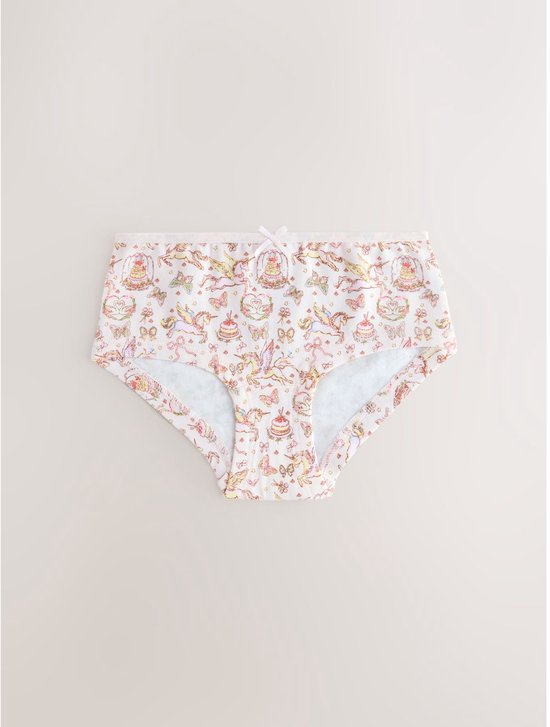 Witte hipster met een print van eenhoorns, cakejes, vlinders en strikjes.