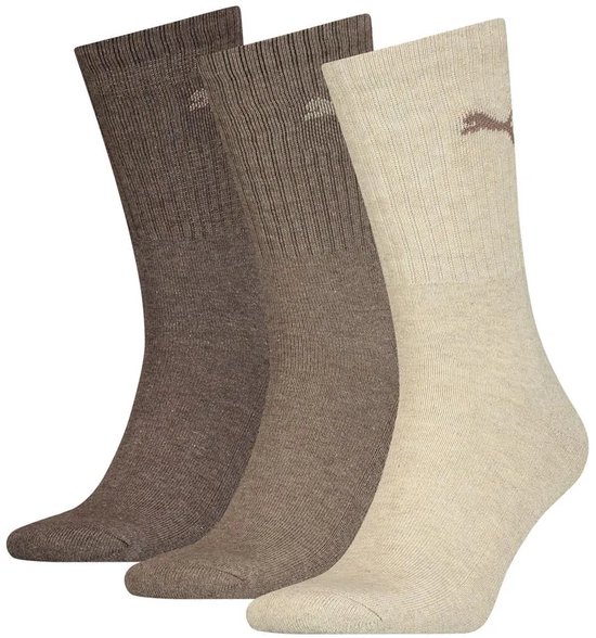 Drie Puma sokken in bruin en beige tinten, met PUMA logo.