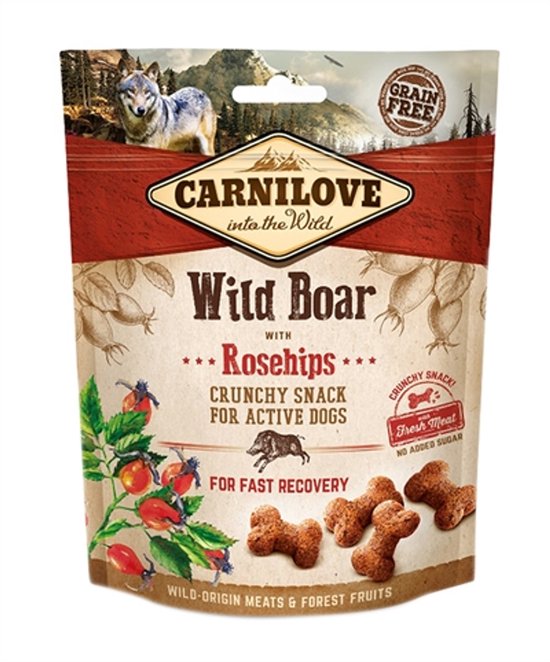 Carnilove verpakking met een wolf, rozenbottels en botvormige snacks. "Wild Boar met Rozenbottels" en "Graanvrij".