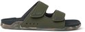 Donkergroene slipper met camouflage zool en klittenbandsluitingen.