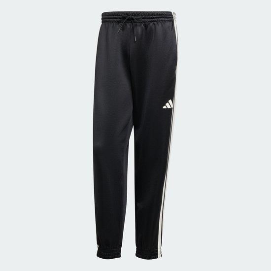 Zwarte trainingsbroek met witte strepen aan de zijkant en een wit Adidas logo.