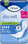 Verpakking TENA Discreet Extra verbanden, met 'UP TO 12HRS DRYNESS' en InstaDRY zone.