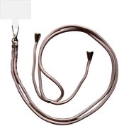 Koperkleurig telefoonkoord met een minimalistisch metalen uiteinde en een wit telefoonplaatje.