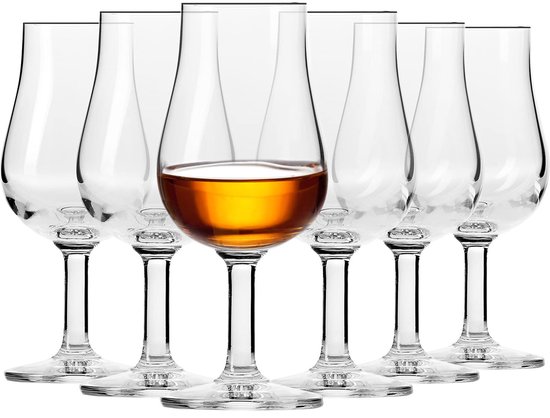 Six verres à whisky KROSNO, dont un rempli d'une liqueur ambrée.