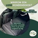 Zwarte hondendeken in de auto met kijkvenster en opbergvakken.
