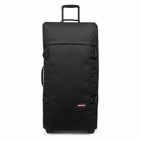 Zwarte Eastpak TRANVERZ L reiskoffer met wieltjes, handvat en gespen.