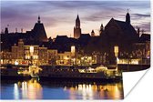 Verlichting langs de Nederlandse wateren in Maastricht Poster 180x120 cm - Foto print op Poster (wanddecoratie woonkamer / slaapkamer) / Europese steden Poster XXL / Groot formaat!
