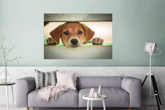 Poster Puppy regarde à travers une cage 180x120 cm - Tirage photo sur Poster (décoration murale salon / chambre) / Poster Animaux domestiques XXL / Groot format!