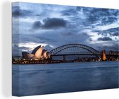Canvas schilderij 140x90 cm - Wanddecoratie Het Opera van Sydney en de Sydney Harbour Bridge in Australië - Muurdecoratie woonkamer - Slaapkamer decoratie - Kamer accessoires - Schilderijen