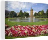 Canvas Schilderij Kleurrijke tuin met bloemen in Mannheim - 60x40 cm - Wanddecoratie