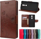 Voor Nokia 2.4 Butterfly Flower Pattern Horizontale Flip Leather Case met houder & kaartsleuven & portemonnee (bruin)