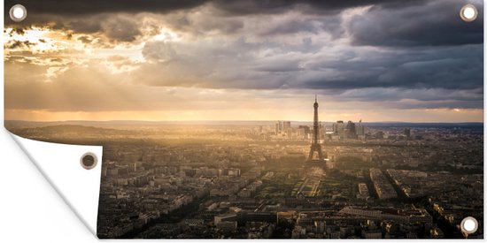 Tuinposter Prachtige skyline over Parijs met heldere zonnestralen die de Eiffeltoren verlichten - 60x30 cm - Tuindoek - Buitenposter