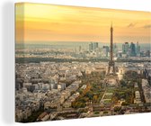 Canvas Schilderij Parijs en de Eifffeltoren met een erg kleurrijke lucht - 120x80 cm - Wanddecoratie