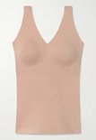 Huidkleurige tanktop met V-hals en ingebouwde cups.